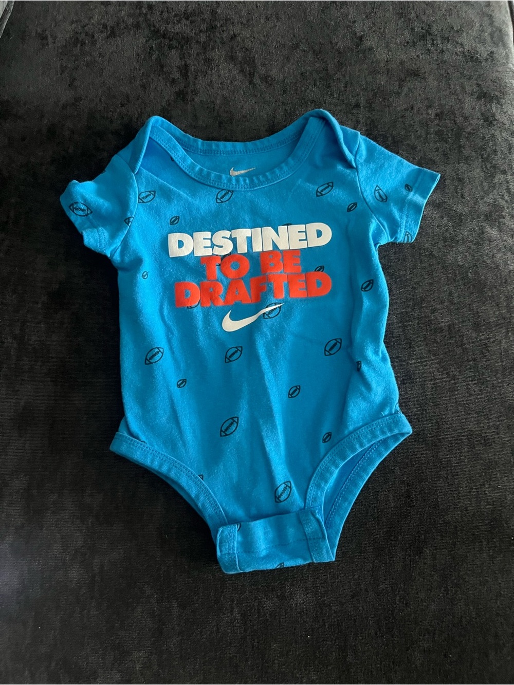 Nike Blue Baby One-Piece Bodysuit with Red and White Graphic